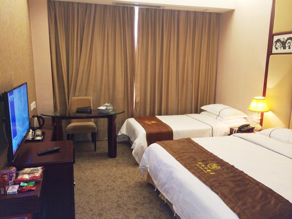 Long Zhou Grand Hotel Guangzhou Kamer foto