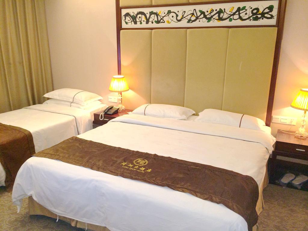 Long Zhou Grand Hotel Guangzhou Kamer foto