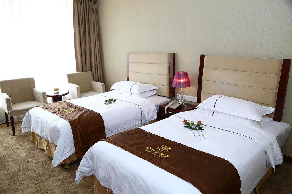 Long Zhou Grand Hotel Guangzhou Kamer foto