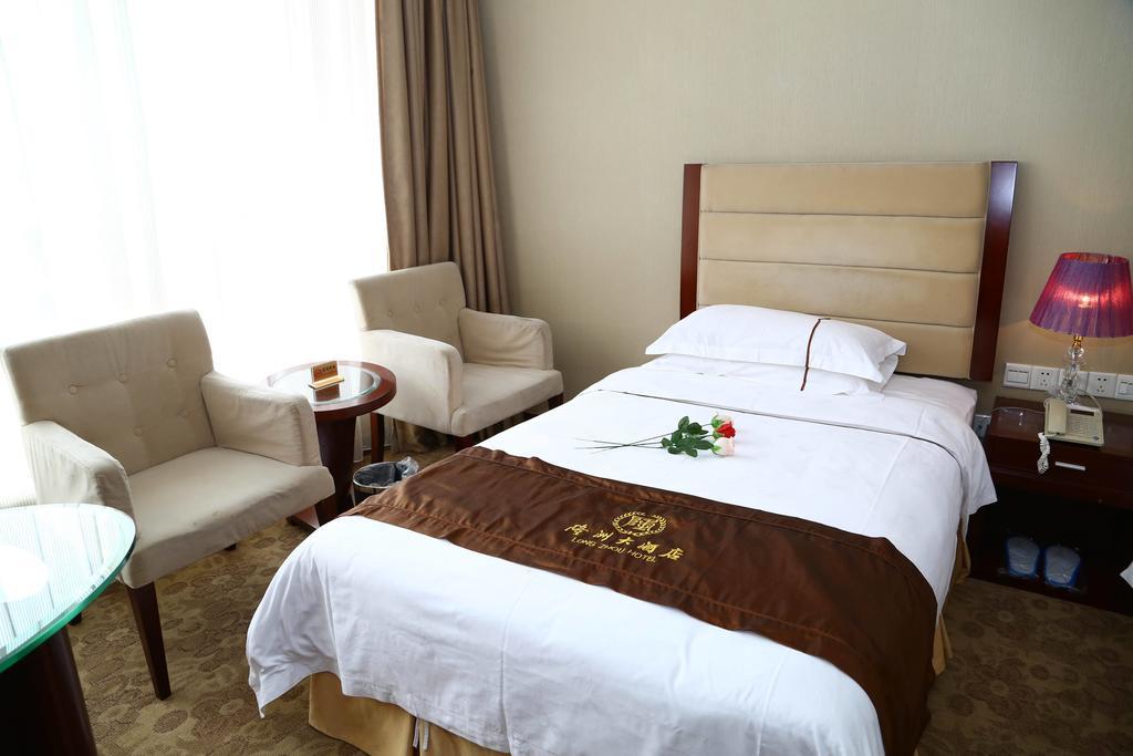 Long Zhou Grand Hotel Guangzhou Kamer foto