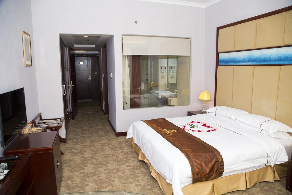 Long Zhou Grand Hotel Guangzhou Kamer foto