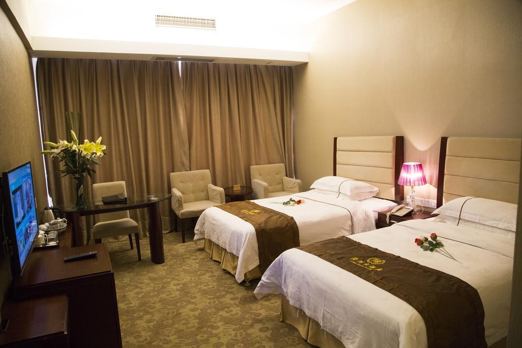 Long Zhou Grand Hotel Guangzhou Kamer foto