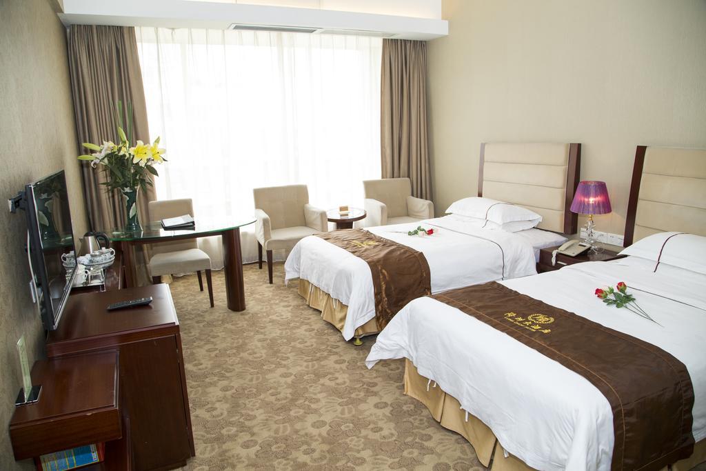 Long Zhou Grand Hotel Guangzhou Kamer foto