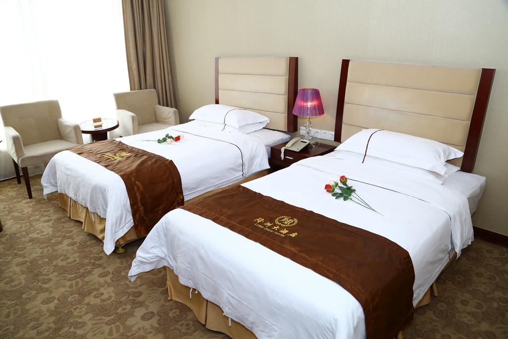 Long Zhou Grand Hotel Guangzhou Kamer foto